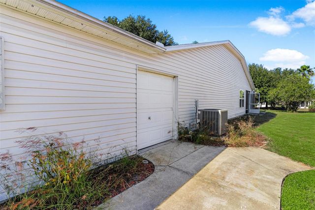 1009 FOREST BREEZE PATH, Leesburg, FL 34748