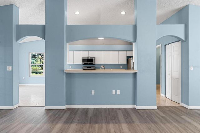 1009 FOREST BREEZE PATH, Leesburg, FL 34748