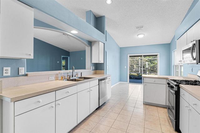 1009 FOREST BREEZE PATH, Leesburg, FL 34748