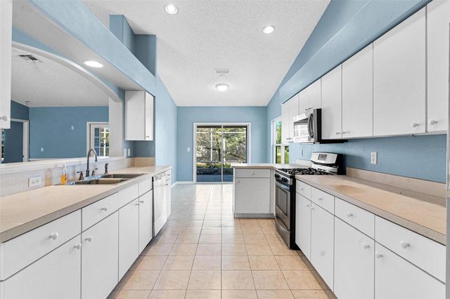 1009 FOREST BREEZE PATH, Leesburg, FL 34748