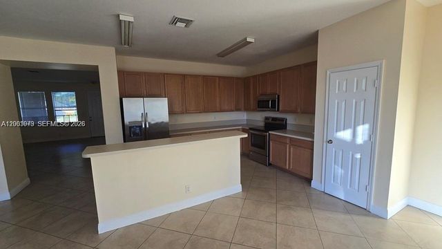 1010 SW DUBUQUE AVE, Port St. Lucie, FL 34983
