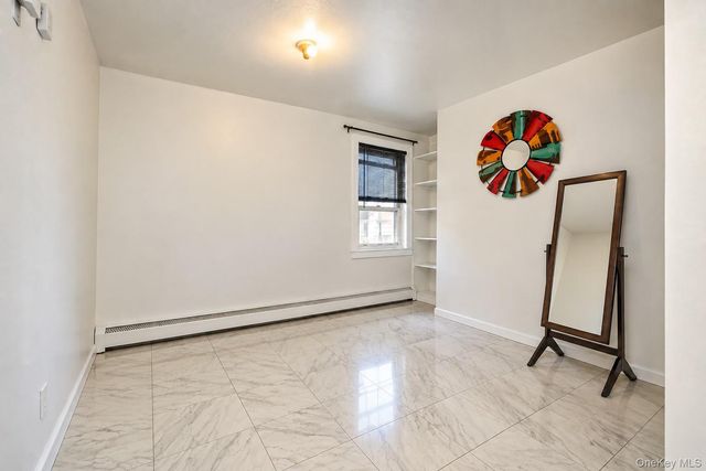 97-16 103rd Street, Ozone Park, NY 11416