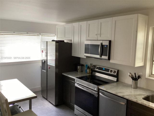 8350 Sands Point Boulevard E201, Tamarac, FL 33321