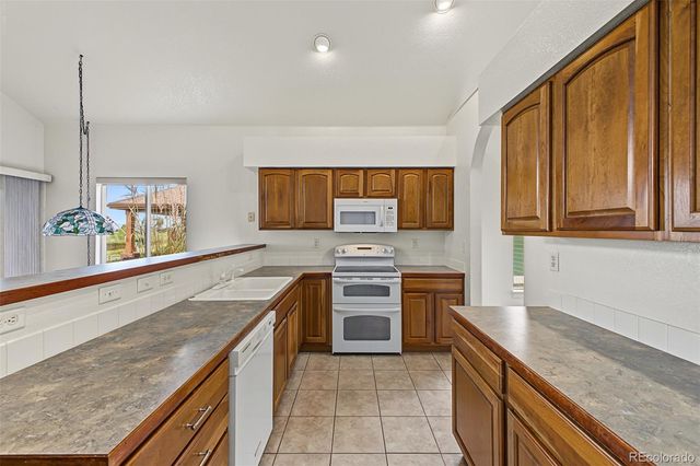 2210 Coyote Creek Drive, Fort Lupton, CO 80621