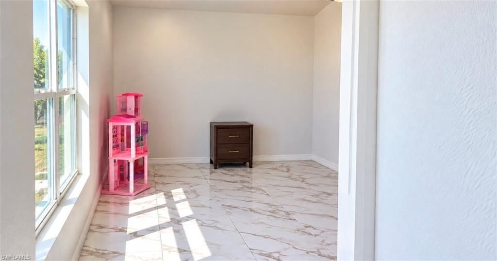 1010 NE 1st AVE, CAPE CORAL, FL 33909 — photo 3