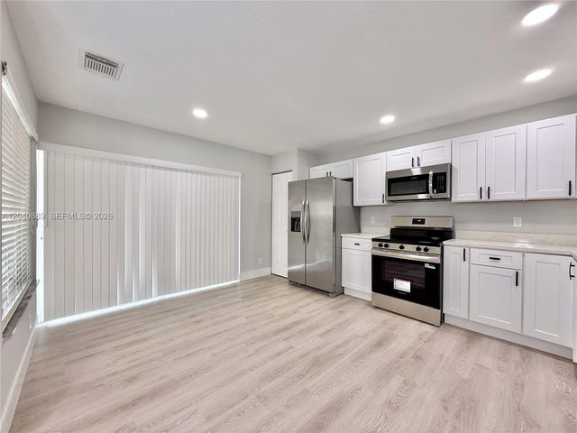 9612 Lily Bank Ct, Riviera Beach, FL 33407