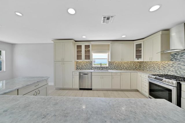 2388 E EDGEWATER Drive, Palm Beach Gardens, FL 33410
