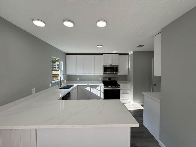 3215 Falling Brook Drive, Kingwood, TX 77345