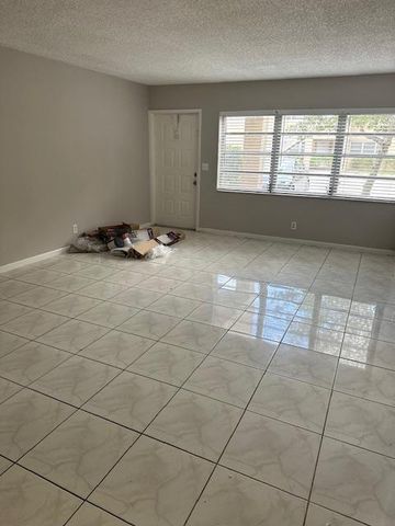 1004 Twin Lakes Drive, Coral Springs, FL 33071