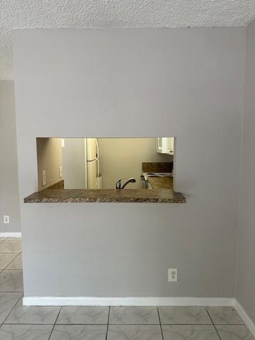 1004 Twin Lakes Drive, Coral Springs, FL 33071