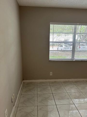 1004 Twin Lakes Drive, Coral Springs, FL 33071