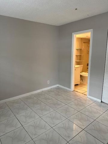 1004 Twin Lakes Drive, Coral Springs, FL 33071
