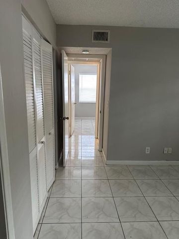 1004 Twin Lakes Drive, Coral Springs, FL 33071