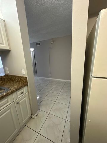 1004 Twin Lakes Drive, Coral Springs, FL 33071