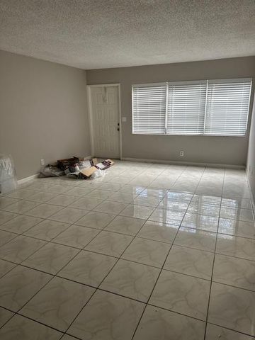 1004 Twin Lakes Drive, Coral Springs, FL 33071