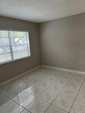 1004 Twin Lakes Drive, Coral Springs, FL 33071