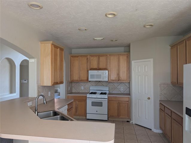 17703 Towne Bridge Drive, Tomball, TX 77377