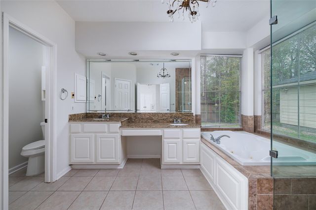 107 N Sunny Slope Circle, The Woodlands, TX 77381