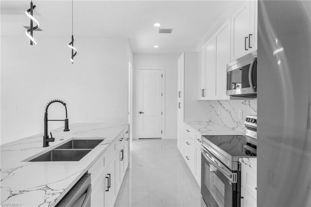 3110 23rd ST SW, Lehigh Acres, FL 33976