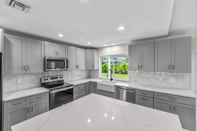 4593 ELLWOOD Drive, Delray Beach, FL 33445