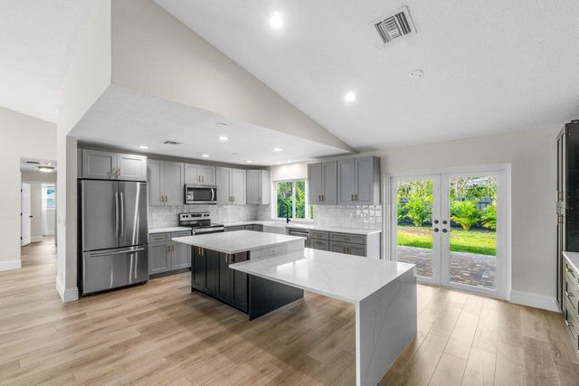 4593 ELLWOOD Drive, Delray Beach, FL 33445