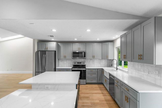 4593 ELLWOOD Drive, Delray Beach, FL 33445