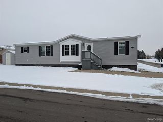 11045 Woodland Ridge Court, South Lyon, MI 48178