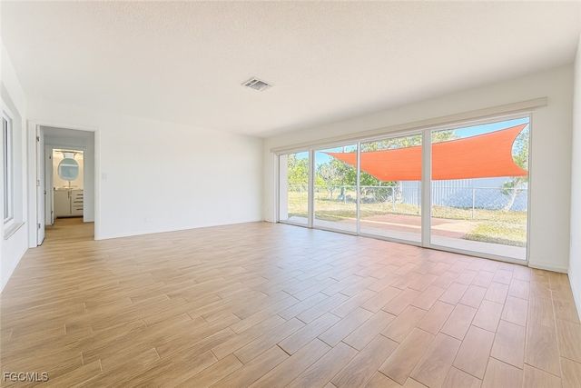 1458 Alwynne DR N, Lehigh Acres, FL 33936