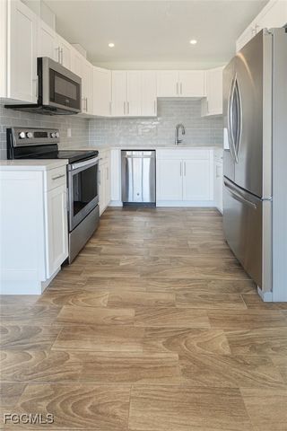 1458 Alwynne DR N, Lehigh Acres, FL 33936