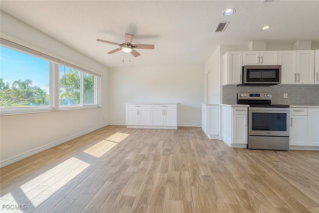 1458 Alwynne DR N, Lehigh Acres, FL 33936