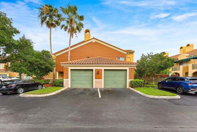 11770 St Andrews Place 102, Wellington, FL 33414