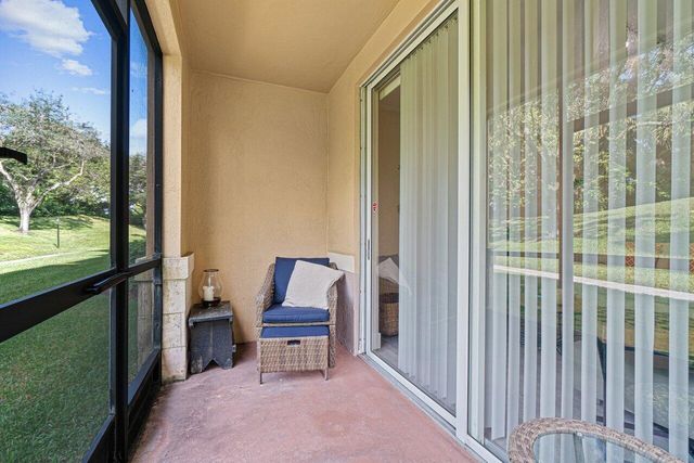 11770 St Andrews Place 102, Wellington, FL 33414
