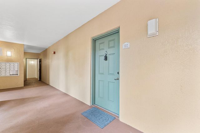 11770 St Andrews Place 102, Wellington, FL 33414