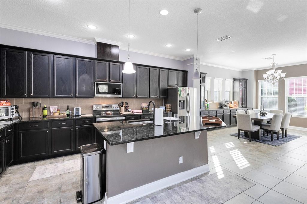 Image 6 of property listing at 8556 TAVISTOCK LAKES BOULEVARD, Orlando, FL 32827