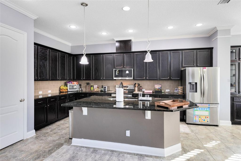 Image 7 of property listing at 8556 TAVISTOCK LAKES BOULEVARD, Orlando, FL 32827