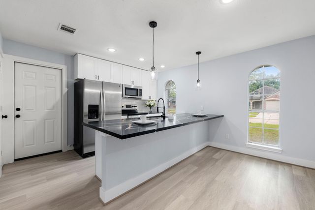 23011 Whispering Willow Drive, Spring, TX 77373