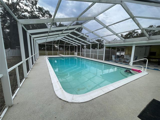 202 S WARFIELD AVENUE, Wildwood, FL 34785