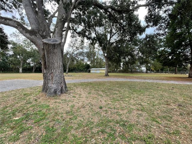 202 S WARFIELD AVENUE, Wildwood, FL 34785