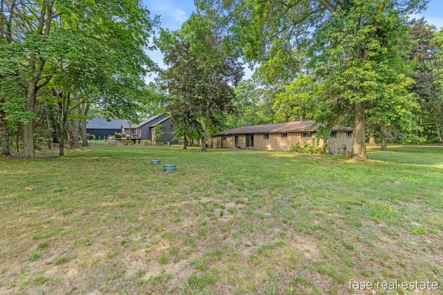 7676 Courtland Drive NE, Rockford, MI 49341