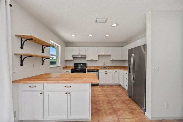 143 Bobwhite Road, Royal Palm Beach, FL 33411