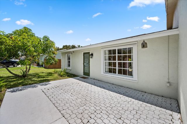 143 Bobwhite Road, Royal Palm Beach, FL 33411