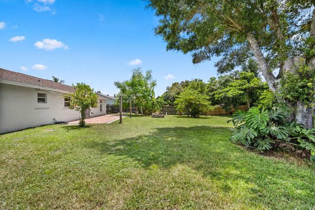 143 Bobwhite Road, Royal Palm Beach, FL 33411