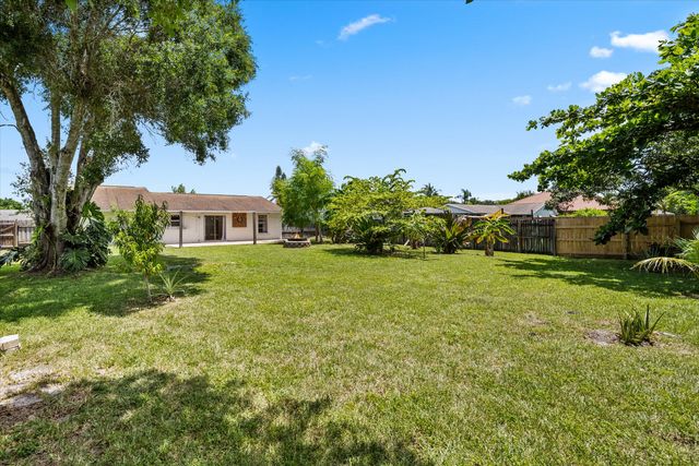 143 Bobwhite Road, Royal Palm Beach, FL 33411