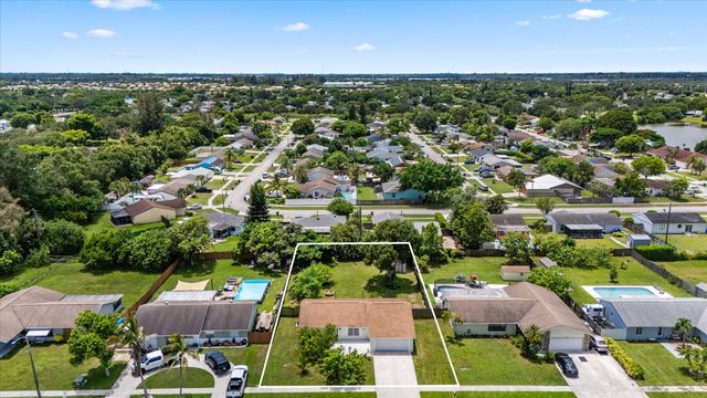 143 Bobwhite Road, Royal Palm Beach, FL 33411