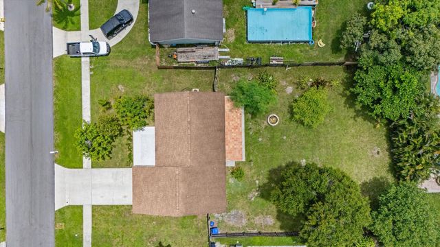 143 Bobwhite Road, Royal Palm Beach, FL 33411