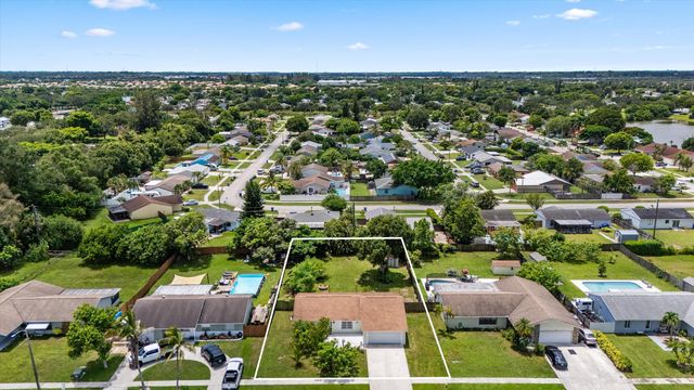 143 Bobwhite Road, Royal Palm Beach, FL 33411