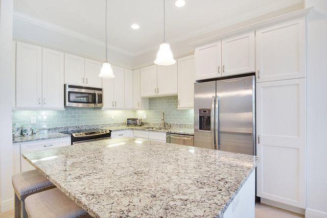 106 Ocean Breeze Drive, Juno Beach, FL 33408