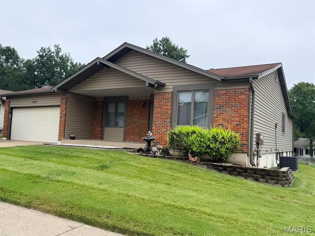 1030 Timberwood Trails Drive, Florissant, MO 63031
