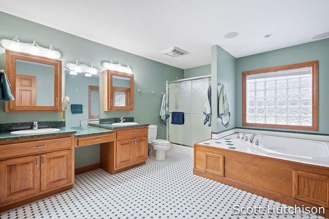 7054 Green Timber Court, Eureka Twp, MI 48838