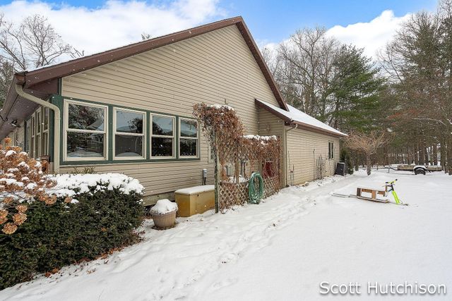 7054 Green Timber Court, Eureka Twp, MI 48838